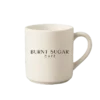 A cream mug with Burnt Sugar's text logo.
