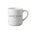 A white mug with Burnt Sugar's text logo.