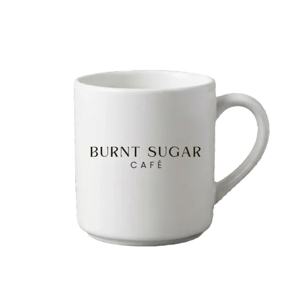 A white mug with Burnt Sugar's text logo.